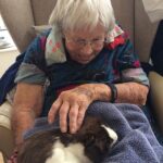 Residents interacting with animals during a ZooLab educational visit at ManuCourt care home