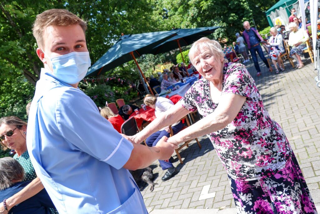 Residents participating in a social activity at ManuCourt care home