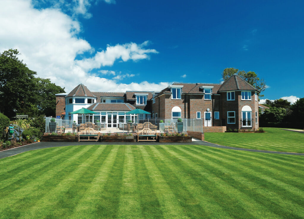 Barton Lodge care home building and garden area