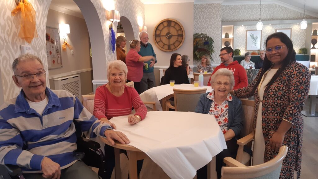 Residents taking part in an indoor activity at ManuCourt care home