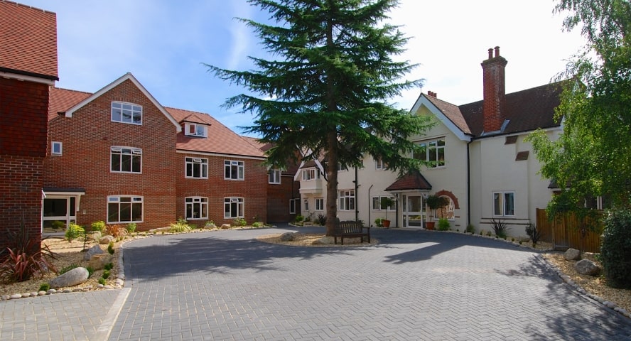 Exterior view of Woodley Grange care home building in Hampshire