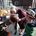 Residents enjoying time together during an activity at ManuCourt care home