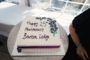 Exterior view of Barton Lodge care home building and grounds