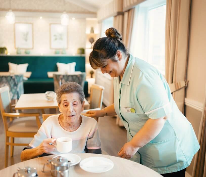 Residents and staff enjoying time together at ManuCourt care home
