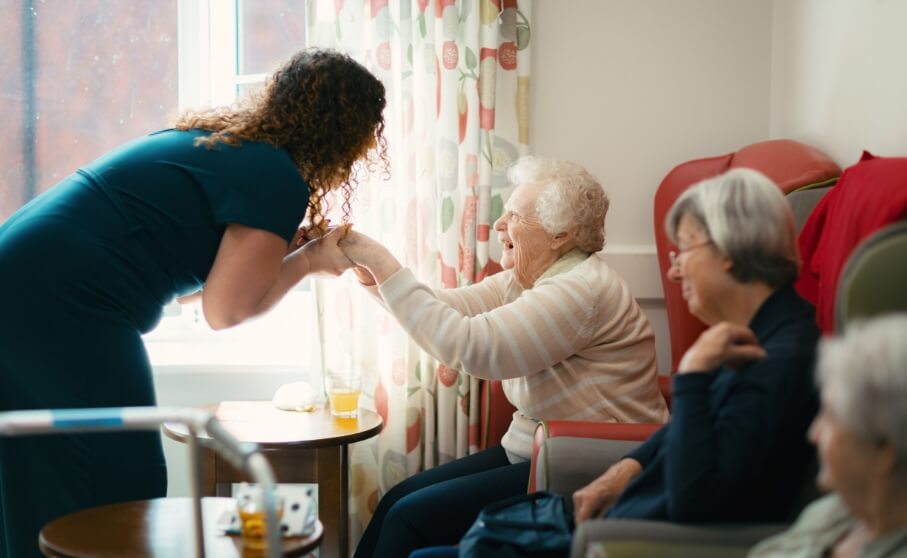 Residents and staff enjoying time together at ManuCourt care home